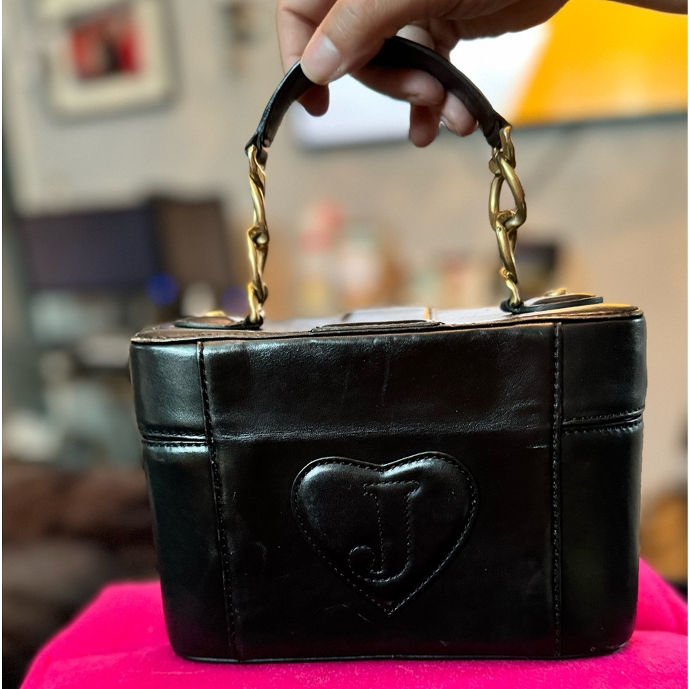 Juicey Cotoure hard case leather handbag